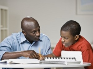 Father helping son with homework